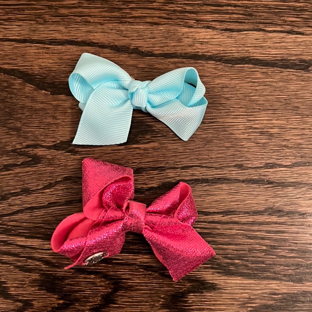 Jo Jo Siwa pink bow and cat and jack blue bow